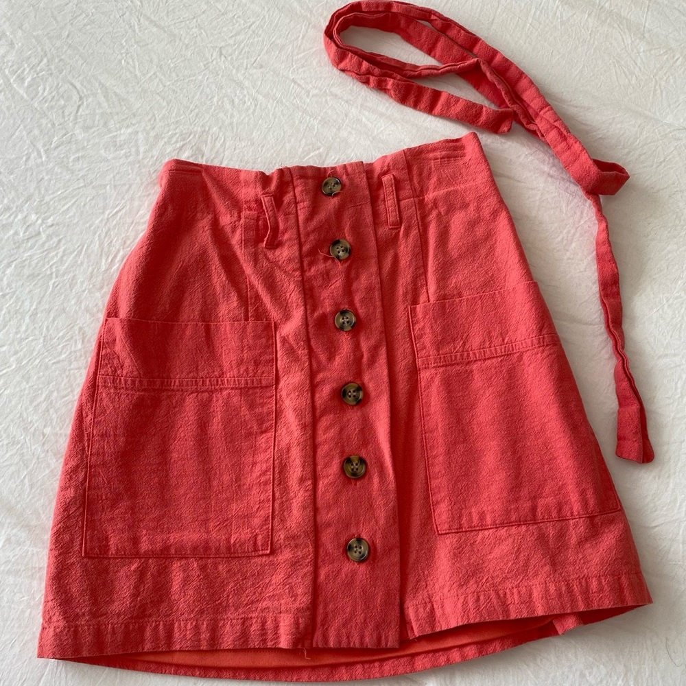 Peachy button super mini skirt